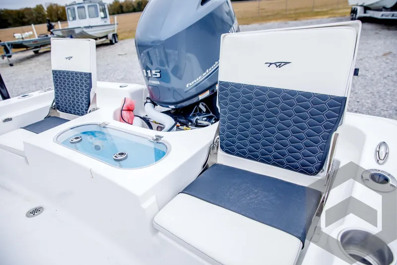 Slide: The Image of 2024 Tidewater 1910 Bay Max boat with Yamaha 115 engine and cushioned seating. - 41
