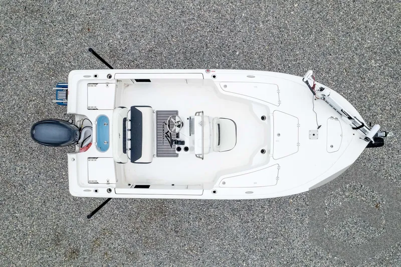 Slide: The Image of 2024 Tidewater 1910 Bay Max boat, top view, on gravel surface. - 47