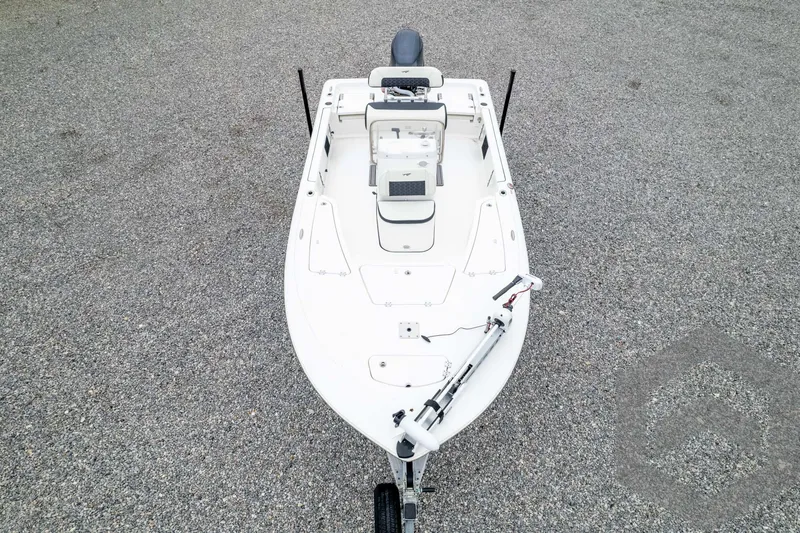Slide: The Image of 2024 Tidewater 1910 Bay Max boat, top view, on a gravel surface. - 48