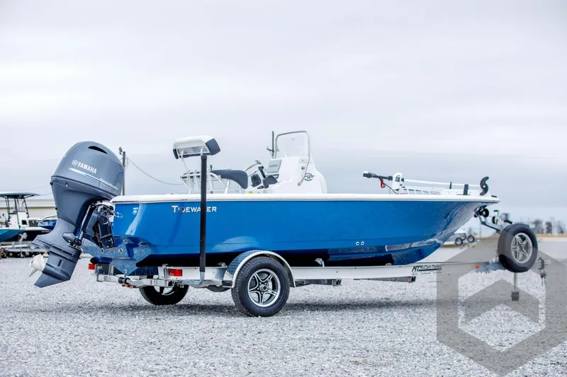 Slide: The Image of 2024 Tidewater 1910 Bay Max boat on trailer with Yamaha outboard motor. - 5