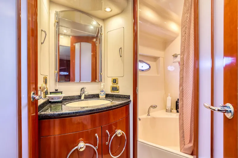 Slide: The Image of Luxurious bathroom interior of 2005 Carver 560 Voyager yacht with elegant wood finish. - 10