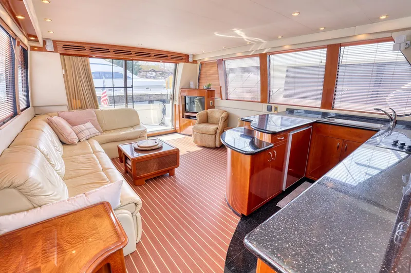 Slide: The Image of Luxurious interior of a 2005 Carver 560 Voyager yacht with elegant furnishings. - 6