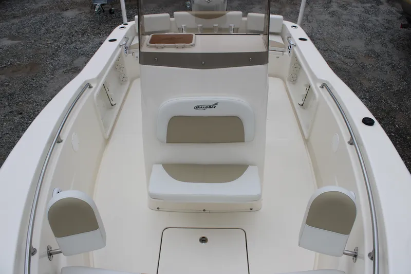 Slide: The Image of 2024 Bulls Bay 200 Center Console boat interior, front seating area. - 14