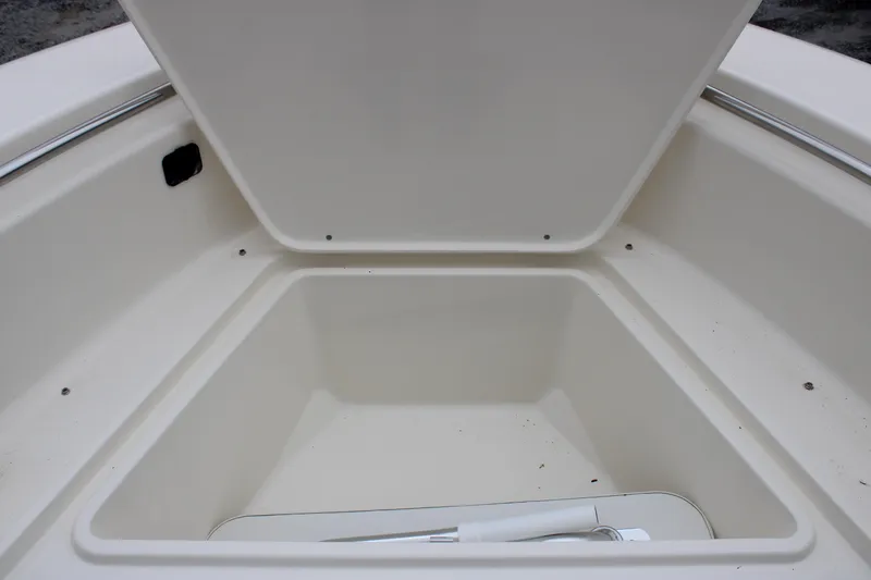 Slide: The Image of 2024 Bulls Bay 200 Center Console storage compartment. - 17