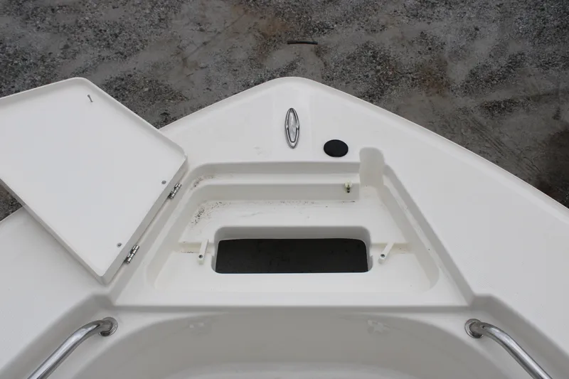 Slide: The Image of 2024 Bulls Bay 200 Center Console bow storage compartment. - 18
