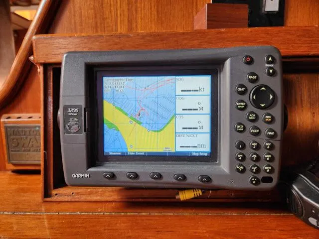 Slide: The Image of Garmin GPS device on a 1984 Nautor Swan 391 sailboat. - 15