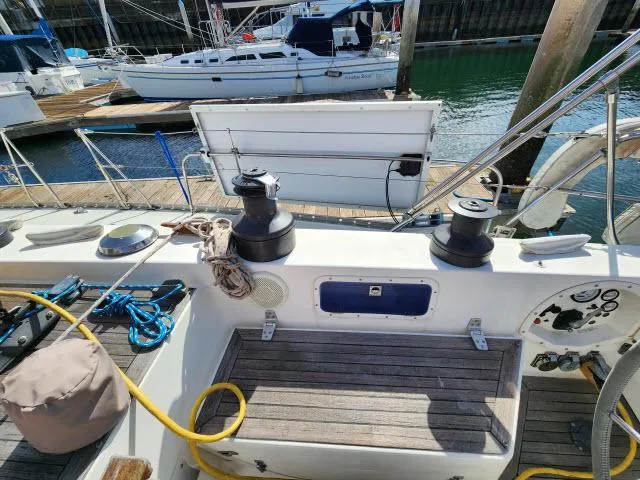 Slide: The Image of Cockpit of a 1984 Nautor Swan 391 sailboat docked at a marina. - 40