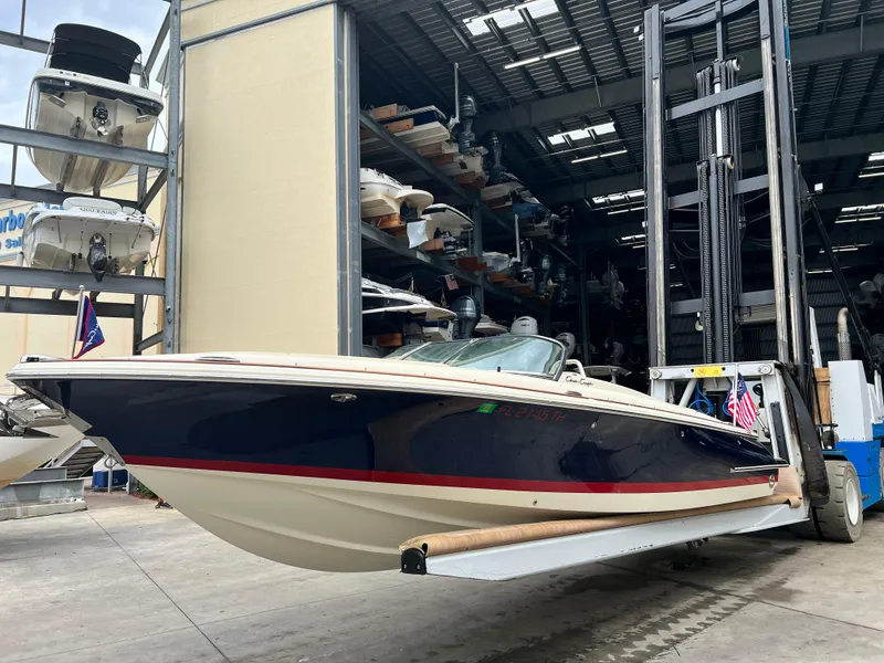Slide: The Image of 2022 Chris-Craft Launch 27 boat in storage facility. - 3