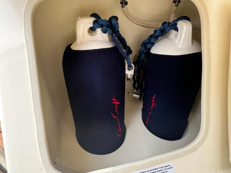 Slide: The Image of Chris-Craft Launch 27 2022 boat fenders in storage compartment. - 30