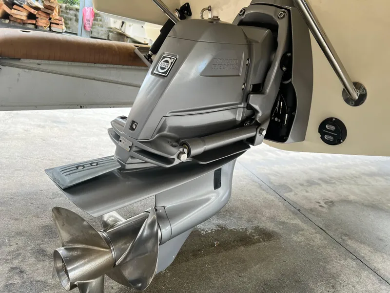 Slide: The Image of 2022 Chris-Craft Launch 27 boat engine and propeller close-up. - 34