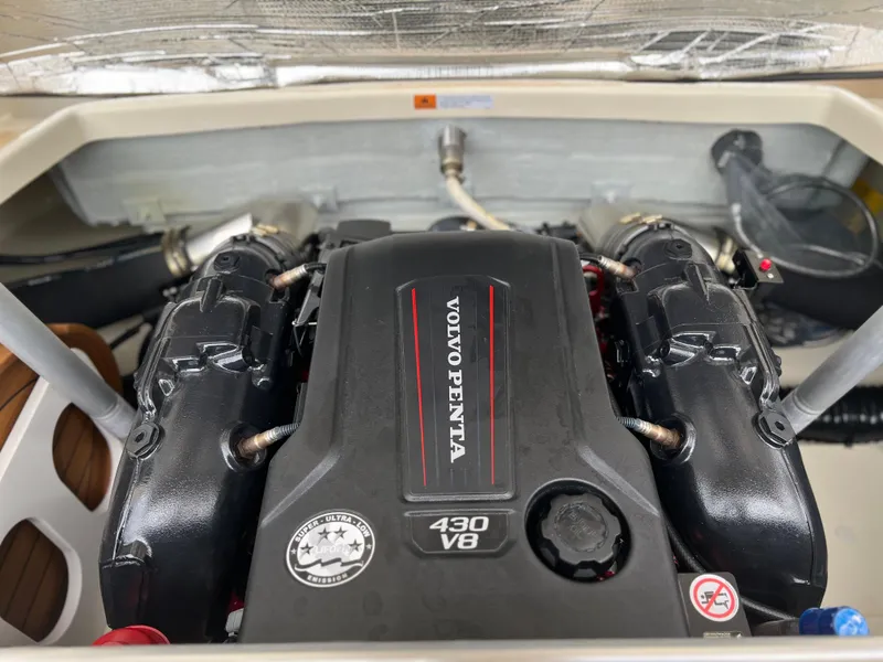 Slide: The Image of 2022 Chris-Craft Launch 27 engine compartment with Volvo Penta 430 V8 engine. - 35