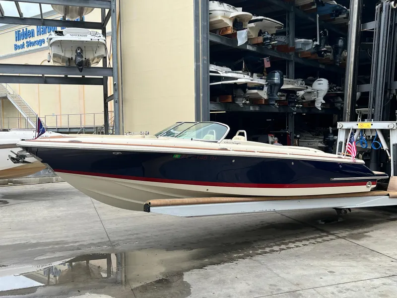 Slide: The Image of 2022 Chris-Craft Launch 27 boat in storage facility. - 6
