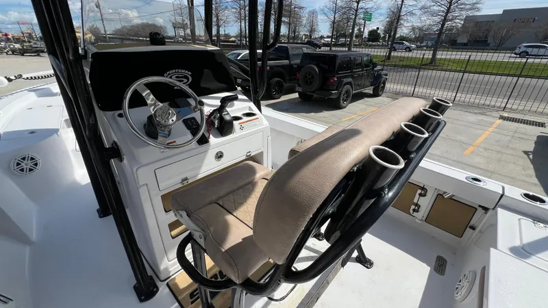 Slide: The Image of 2019 Sportsman 227 MASTERS Platinum boat cockpit with steering wheel and seating. - 11