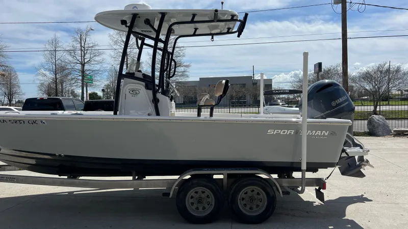 Slide: The Image of 2019 Sportsman 227 MASTERS Platinum boat on a trailer, side view. - 6