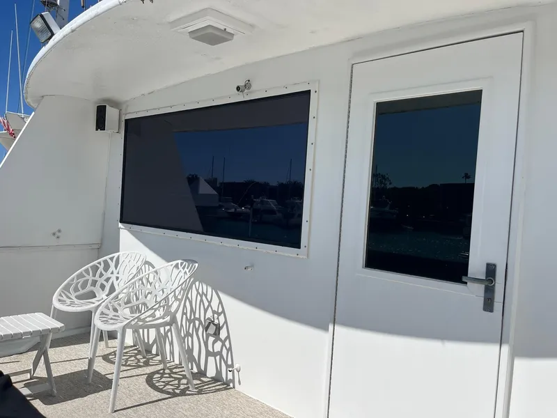 Slide: The Image of Outdoor seating area on 1986 Hatteras 70' Cockpit Motor Yacht. - 36
