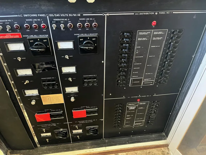 Slide: The Image of Electrical control panel of a 1986 Hatteras 70' Cockpit Motor Yacht. - 39