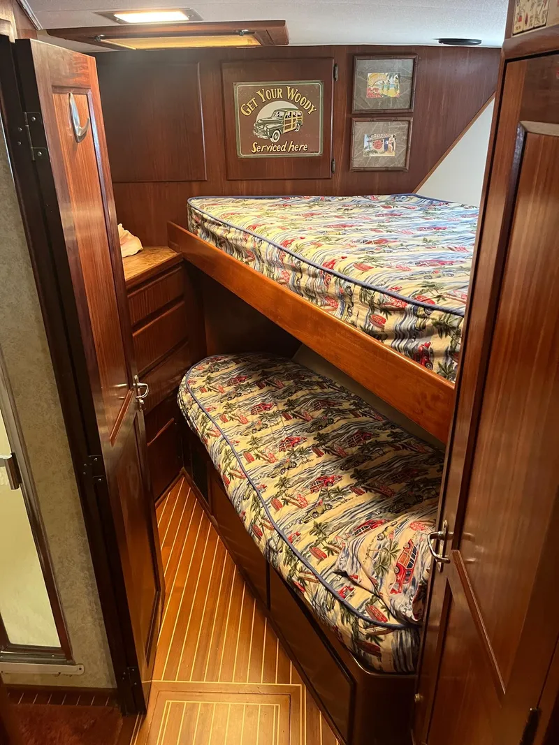 Slide: The Image of Bunk beds in the cabin of a 1986 Hatteras 70' Cockpit Motor Yacht. - 8