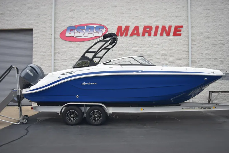 The Image of 2024 Hurricane SunDeck 2600 OB boat on a trailer at GSPS Marine dealership. - 1