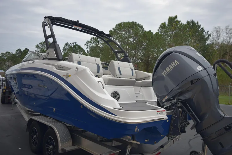 Slide: The Image of 2024 Hurricane SunDeck 2600 OB boat with Yamaha outboard motor on trailer. - 6