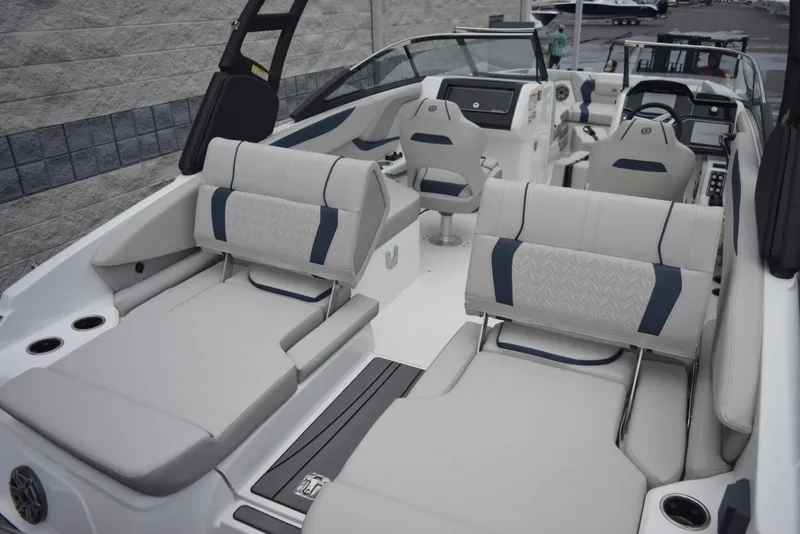 Slide: The Image of 2024 Hurricane SunDeck 2600 OB boat interior with spacious seating and modern design. - 8