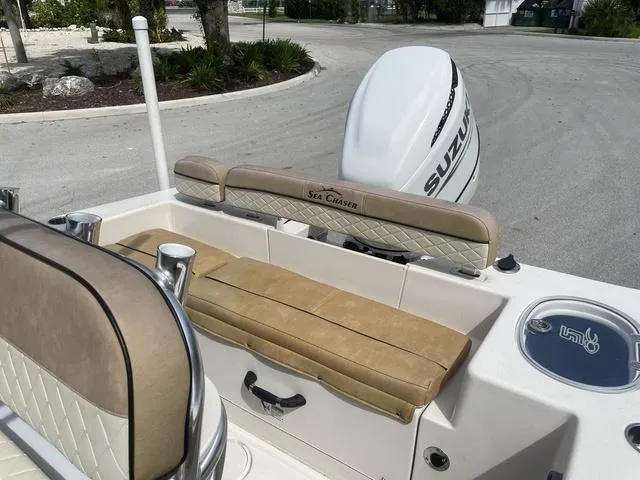 Slide: The Image of 2023 Sea Chaser 22 HFC boat interior with seating and steering console. - 13