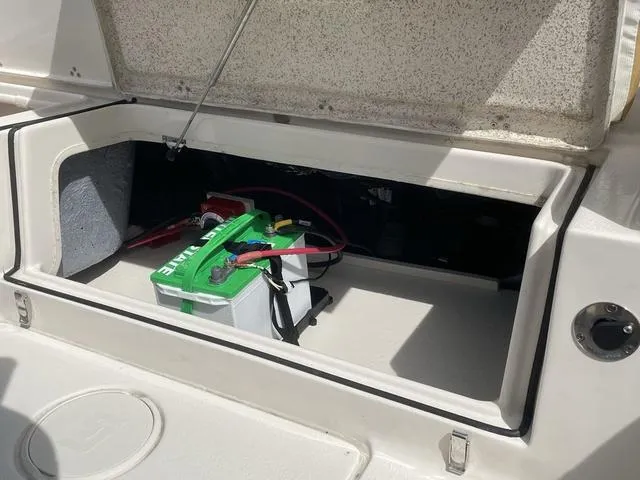 Slide: The Image of 2023 Sea Chaser 22 HFC boat interior wiring compartment. - 17