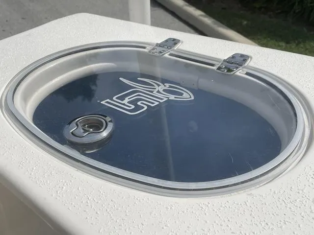 Slide: The Image of Battery compartment of a 2023 Sea Chaser 22 HFC boat. - 18