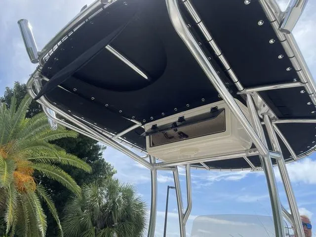 Slide: The Image of 2023 Sea Chaser 22 HFC boat interior with storage compartments and seating. - 24