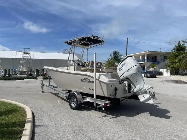 Slide: The Image of 2023 Sea Chaser 22 HFC boat on trailer, rear view, parked outdoors. - 4