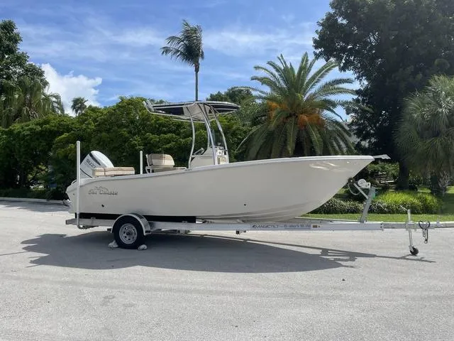 Slide: The Image of 2023 Sea Chaser 22 HFC boat on trailer in tropical setting. - 8