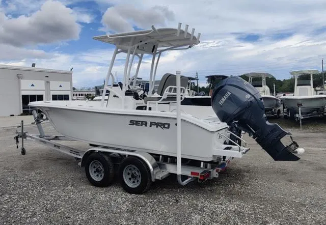 Slide: The Image of 2024 Sea Pro 202 CC boat on trailer with Yamaha outboard motor. - 11