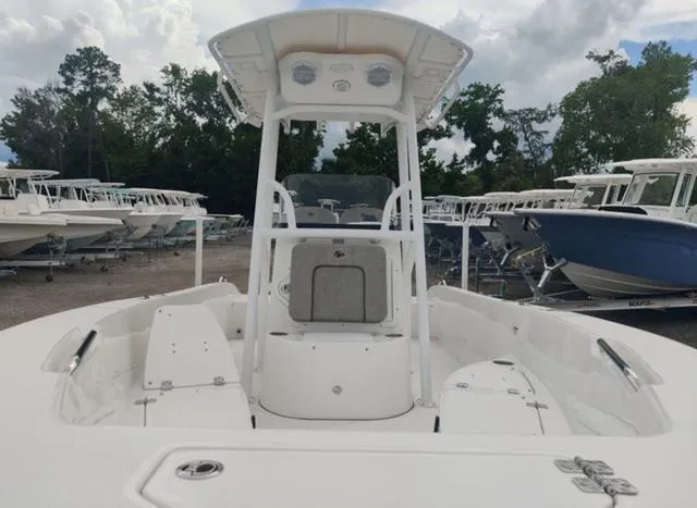 Slide: The Image of 2024 Sea Pro 202 CC center console boat in a marina. - 12