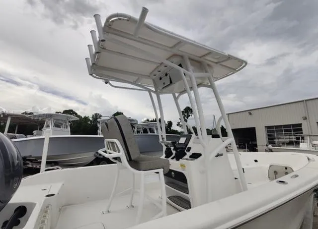 Slide: The Image of 2024 Sea Pro 202 CC center console boat with T-top and captain's chair. - 14
