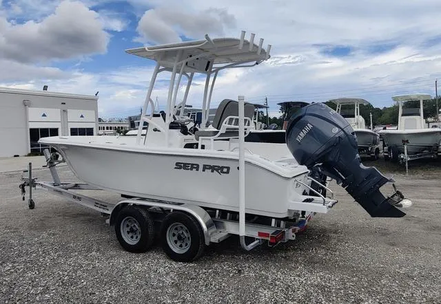 Slide: The Image of 2024 Sea Pro 202 CC boat on trailer with Yamaha outboard motor. - 3