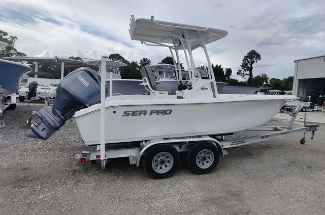 Slide: The Image of 2024 Sea Pro 202 CC boat on a trailer with Yamaha outboard motor. - 5