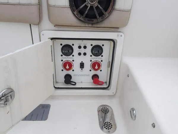 Slide: The Image of Control panel of a 2019 Sea Chaser 27 HFC boat with open access door. - 13