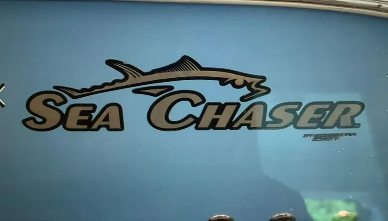 Slide: The Image of Logo of 2019 Sea Chaser 27 HFC boat on a blue background. - 17