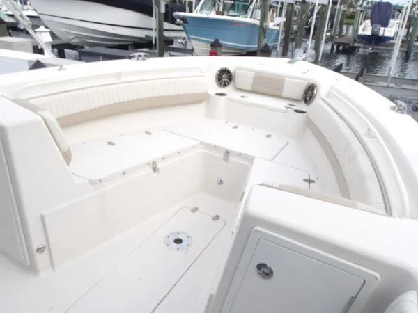 Slide: The Image of 2019 Sea Chaser 27 HFC boat interior with spacious seating and storage compartments. - 8