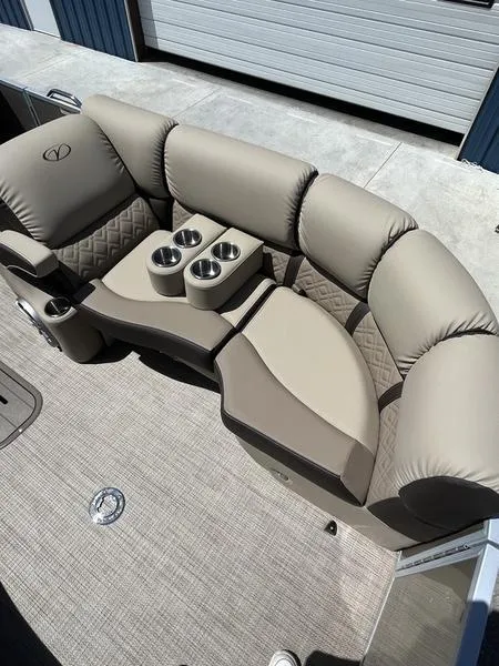 Slide: The Image of 2023 Veranda VP22VLB pontoon boat with luxurious seating and cup holders. - 12