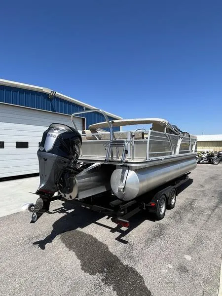 Slide: The Image of 2023 Veranda VP22VLB pontoon boat with outboard motor on trailer. - 3