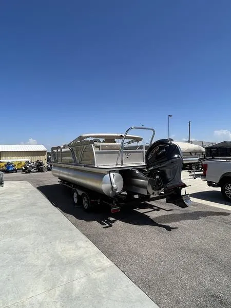 Slide: The Image of 2023 Veranda VP22VLB pontoon boat on trailer in outdoor lot. - 5