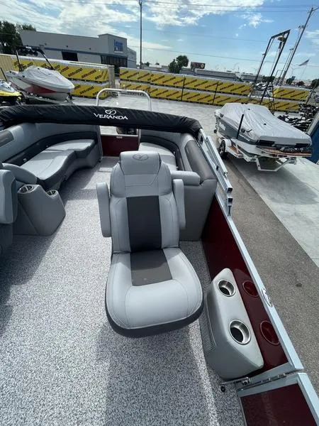 Slide: The Image of 2023 Veranda VR22RC pontoon boat with luxurious seating and modern design. - 8