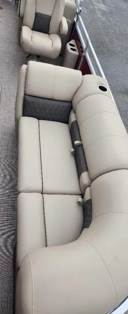 Slide: The Image of 2024 Sun Tracker Party Barge 22 RF XP3 beige seating with cup holders. - 5