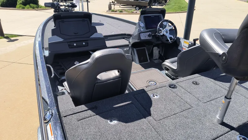 Slide: The Image of 2024 Nitro Z21 XL Pro fishing boat interior with dual seats and advanced dashboard. - 3