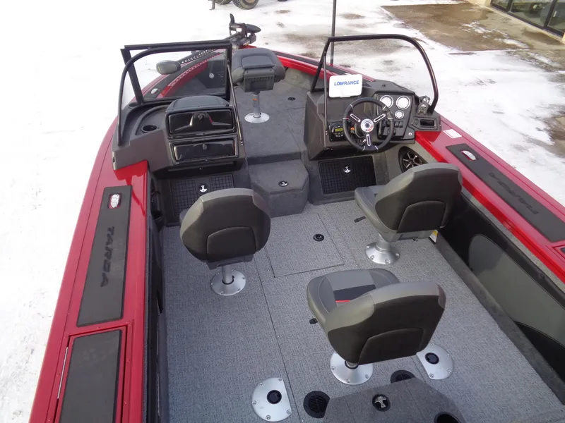 Slide: The Image of 2024 Tracker Targa V-19 WT boat interior with seating and steering console. - 5
