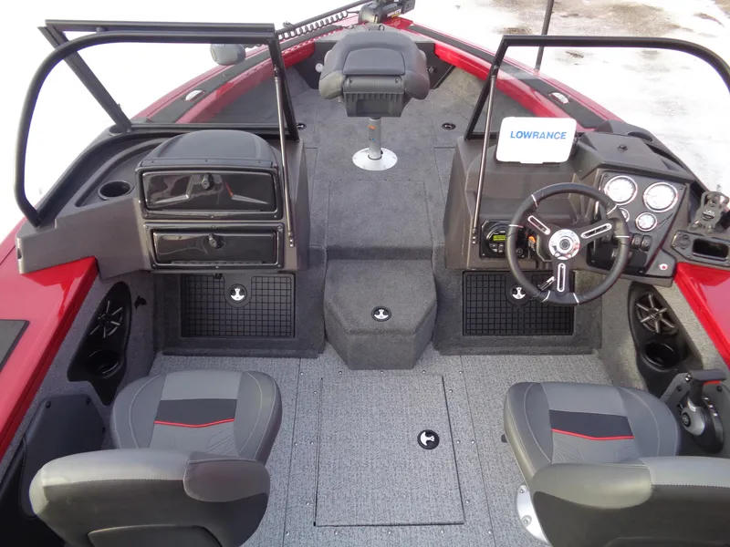 Slide: The Image of 2024 Tracker Targa V-19 WT boat interior with steering wheel and seating. - 6