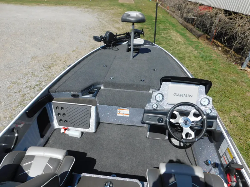 Slide: The Image of 2024 Nitro Z19 boat interior with Garmin navigation system and seating. - 3