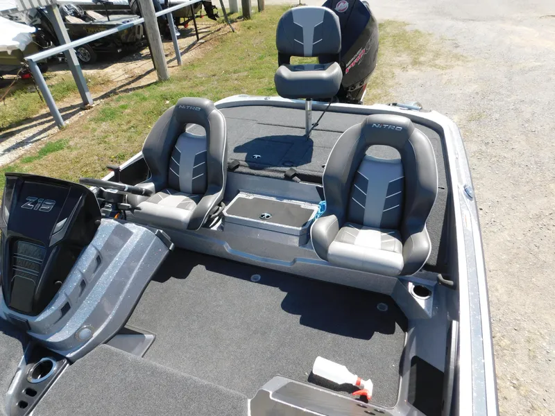 Slide: The Image of 2024 Nitro Z19 boat interior with dual seats and steering console. - 6