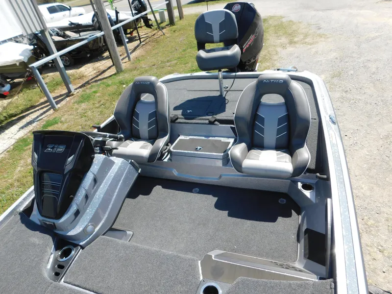 Slide: The Image of 2024 Nitro Z19 boat interior with dual seats and storage compartments. - 7