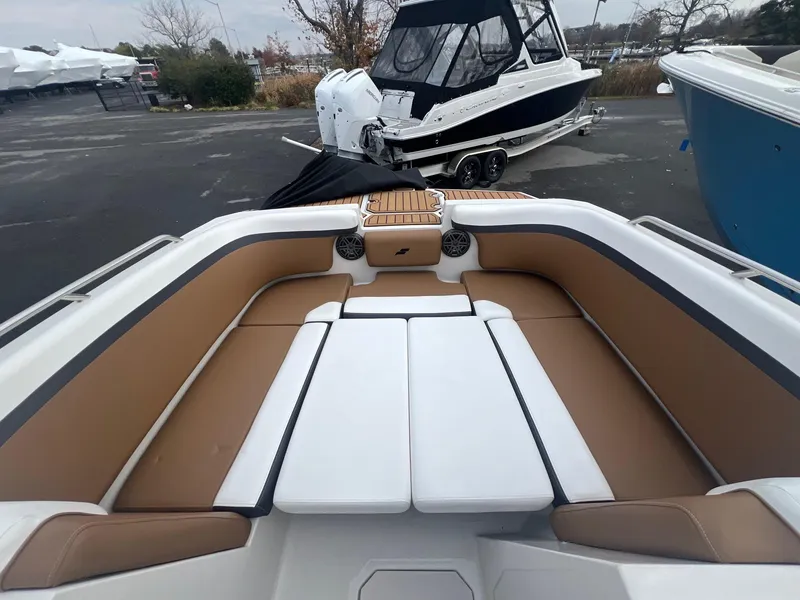 Slide: The Image of Interior of 2024 Starcraft SVX 231 OB DH boat with modern seating. - 13